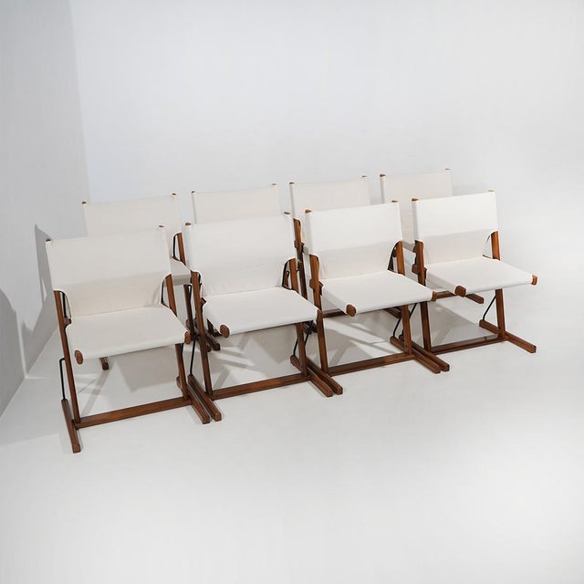 The "Nina & Santamaria" chairs, designed by Piero De Martini for Cassina in the 1970s, offer a refined interpretation of...