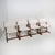 The "Nina & Santamaria" chairs, designed by Piero De Martini for Cassina in the 1970s, offer a refined interpretation of...