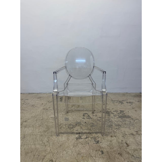 Single Louis Ghost arm chair in crystal designed by Philippe Starck for Kartell. Louis Ghost is the world’s bravest...