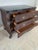Add classic European elegance to your home with this striking vintage 1980s Bombay (bombé) chest. Originally retailed by...