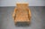 A beautiful vintage rattan armchair produced by ULUV in Czechoslovakia during the 1960s. This Mid-Century Modern lounge...