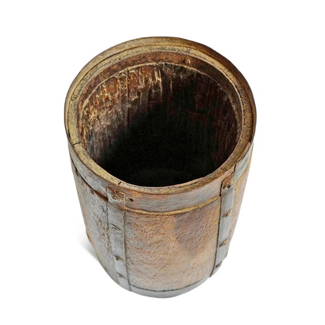 Antique small round wood village pot from India. Beautiful original iron and brass decorative metal work. Characteristic...