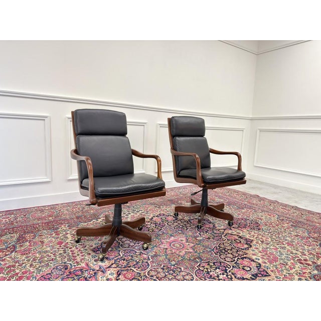 English Chesterfield Office Chairs, Set of 2, in Very Good conditions. Designed 1920 to 1949 This piece has an attribution...