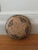 Beautiful round hand-made African woven basket blue and brown. Decorative and functional. Good condition. Acquired at an...