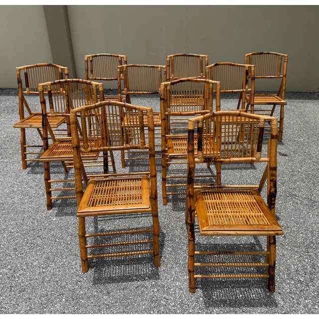 Enhance your dining area with this set of 10 Boho Chic Rattan Folding Chairs. These chairs feature a distinctive burnt...