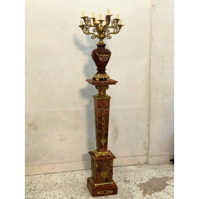 Add a dramatic touch of French-inspired elegance to your interior with this striking black pedestal and decorative vase...