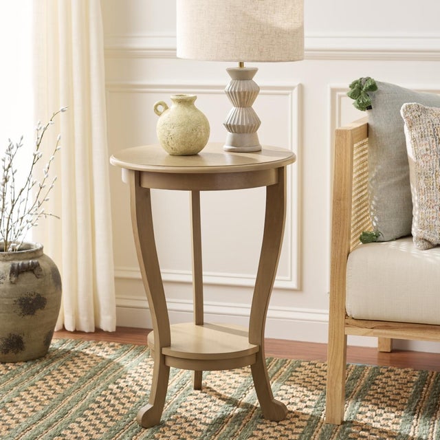 The Mary Pedestal Side Table, crafted of pine with a desert brown finish, is the perfect accent for any room in need of a...