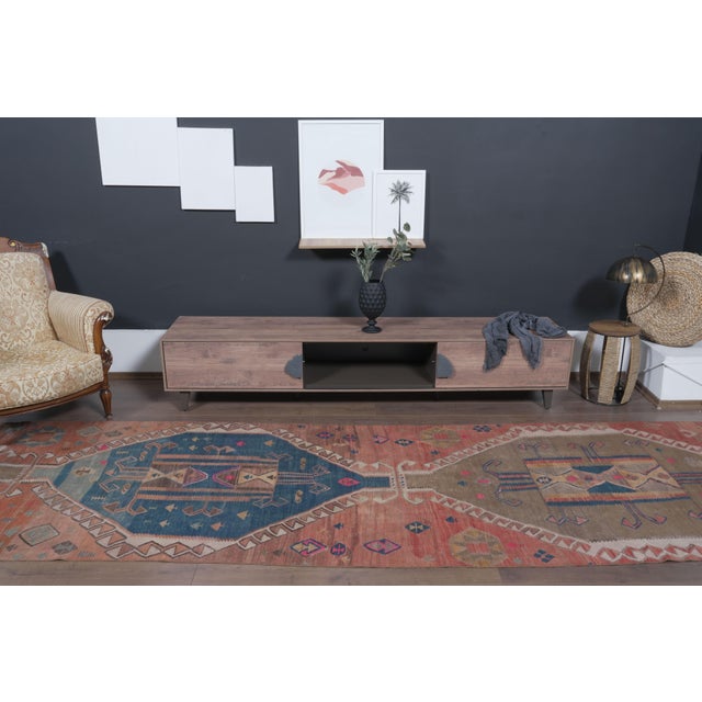 Type: Vintage Hallway Runner Rug Origin: Anatolia / Turkey (Handwoven) Technique: Hand-Knotted, Shaved / Distressed Low...