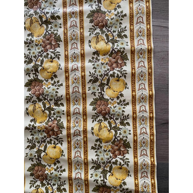 Apples, berries and flowers Browns and gold with off white background Stripes Vinyl, some texture to surface Not pre-...
