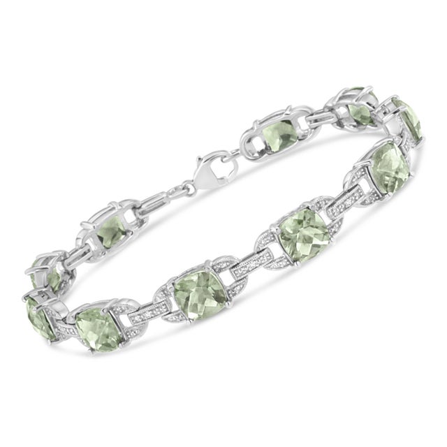 Classy and feminine, this green amethyst and diamond tennis bracelet is designed especially for your lady love. Styled in...