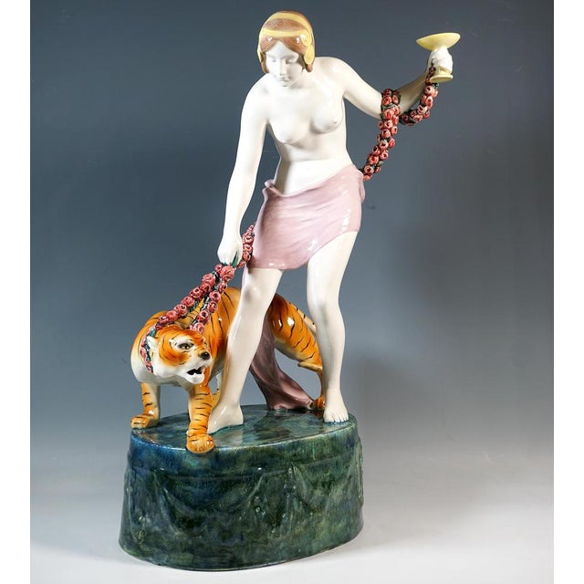 Excellent art nouveau design, executed in the early 1920s: youthful beauty with art nouveau headdress on her hair tied at...