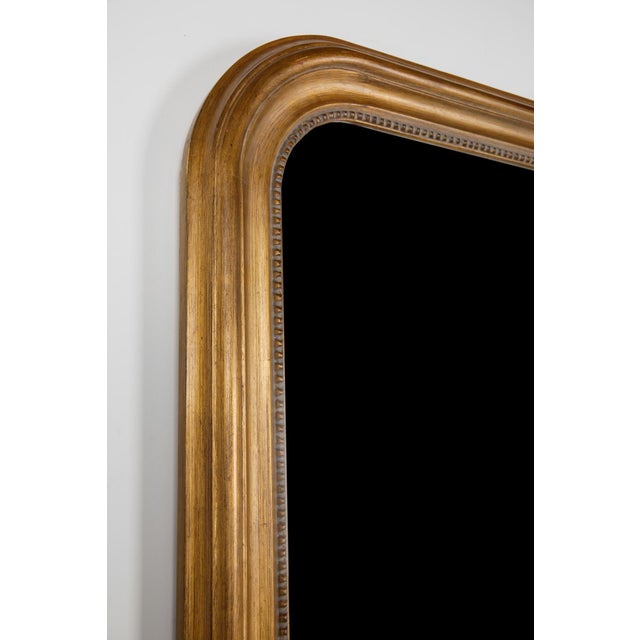 Hand-carved with beaded detail and exquisite aged gilt painting technique, this piece was created in Biarritz, France and...