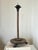 Primitive, antique wood candlestick with tripod-footed base. Unique details include dramatic height, hexagonal drip pan,...