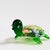 A petite vintage art glass turtle figurine.