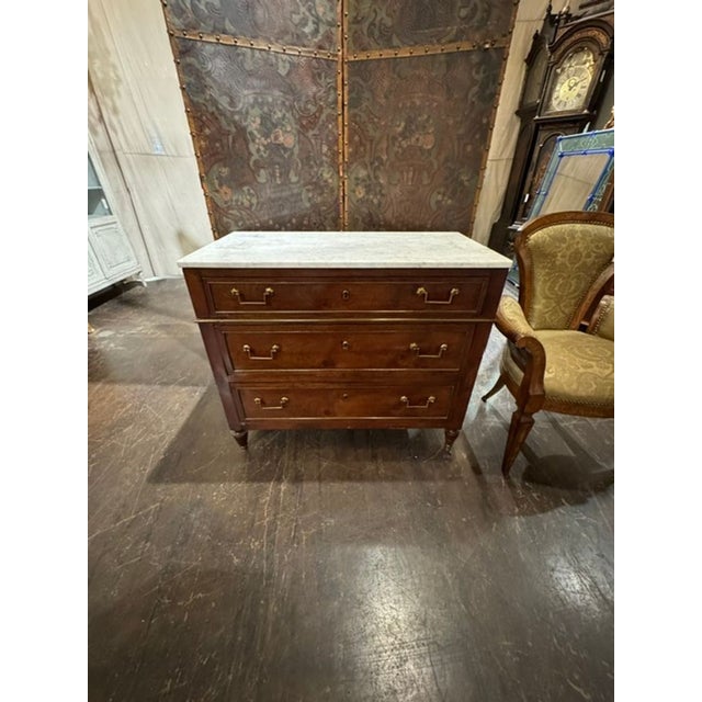 The product is a 19th century French Directoire mahogany chest, which is a stylish and classic piece of furniture for any...