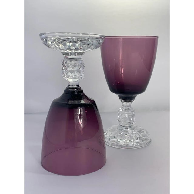 Vintage Fostoria 1948-1964 amethyst crystal goblets in the American Lady pattern. Measuring 6 1/8”T X 3 1/4”W. This...