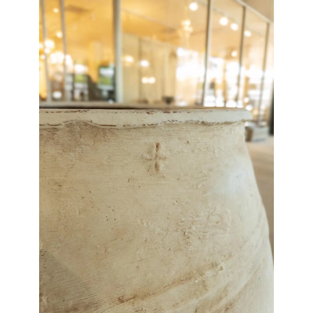 The Antique Large Greek Terracotta Pot is a striking example of ancient craftsmanship, designed to serve both functional...