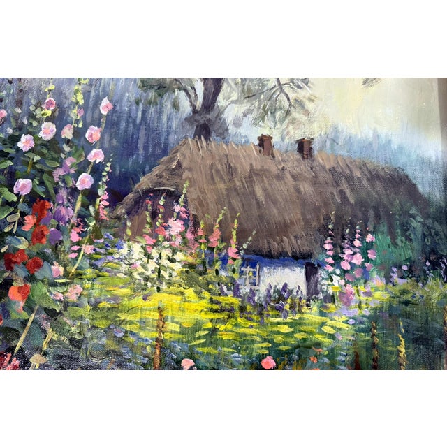 Beautiful oil on canvas cottage scene by Alojzy Balcerzak (Polish, 1930–2021). Thatch-roofed cottage set in a flower...