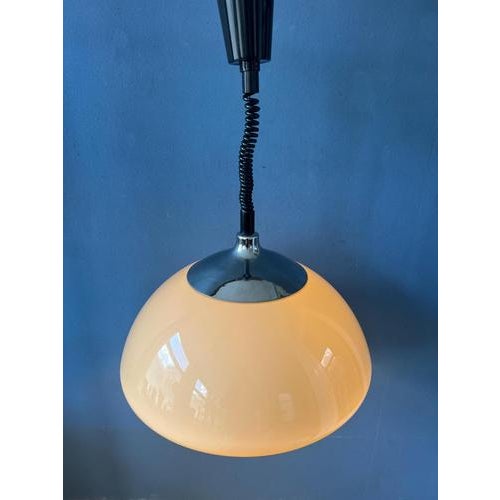 Vintage space age pendant light by Dijkstra with acrylic glass shade and chrome top cap. The beige/brown mushroom shade...