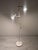 Stylish 1970s Floor Lamp Stylish, retro floor lamp from the 1970s. White metal construction with two movable spotlights....