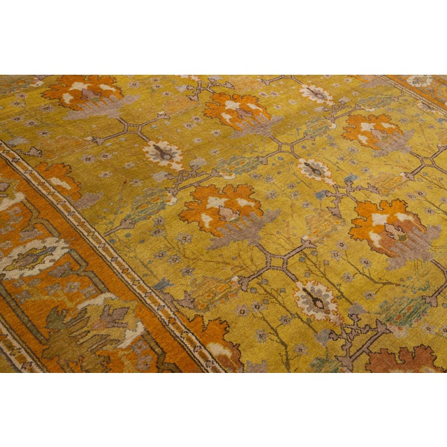 Vintage Arts and Crafts Style Golden Ochre Wool Rug With Stylized Floral Motif For Sale - Image 4 of 11