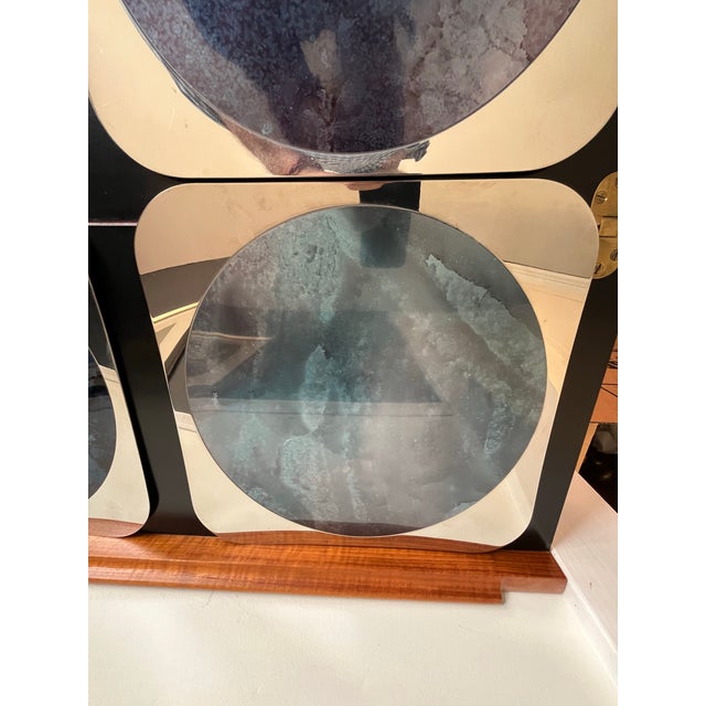 A rare and visually arresting set of French modernist chargers designed by artist Jean-Luc Bertrand for Bouillet-...