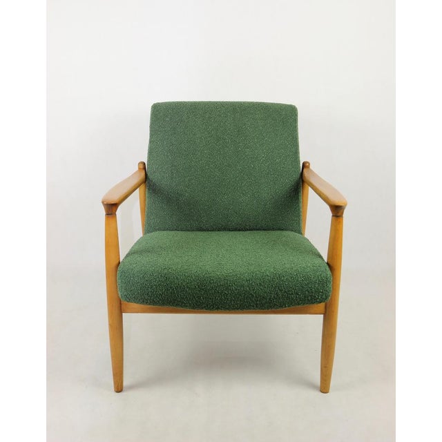 - A vintage easy chair - model GFM-64 - Designed by Edmund Homa - from the 1970s - Reupholstered in boucle fabric in green...