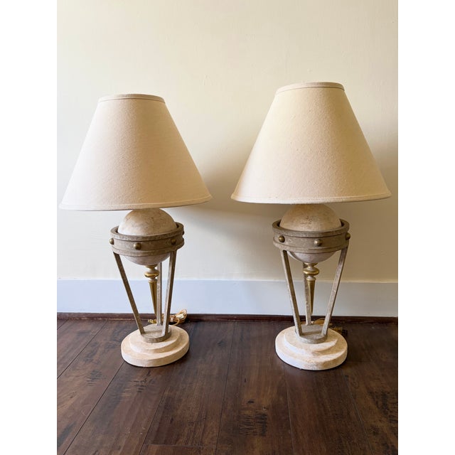 Striking matching pair of vintage neoclassical sculptural table lamps attributed to Michael Taylor, featuring substantial...