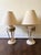 Striking matching pair of vintage neoclassical sculptural table lamps attributed to Michael Taylor, featuring substantial...