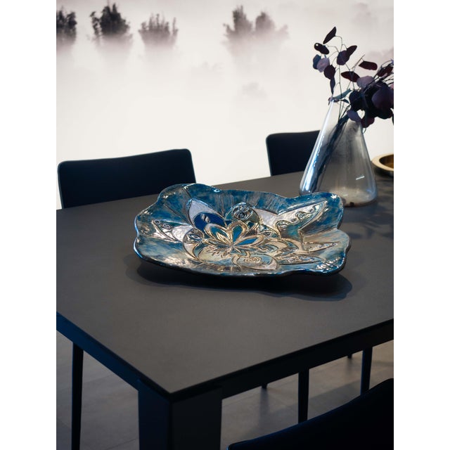 Positive Thought is a sculptural Raku ceramic centerpiece dedicated to the regenerative power of nature. The central...