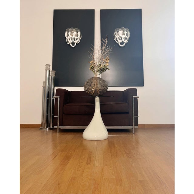 Pair of Italian vintage Murano wall lights made by 10 glass leaves for each applique in a chrome frame. The originality of...