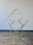 Fabulous vintage diamond brass and glass etagere in the style of Milo Baughman. Four floating glass shelves. All the drama...