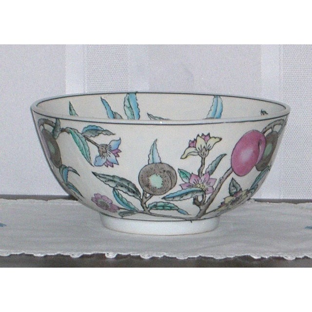 Mid-Century large bowl imported from China. Beautiful porcelain, expertly hand-painted with the classic "Nine Peaches"...