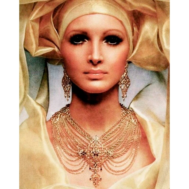 1969 goldtone openwork with textured and raised smooth sections brooch with security clasp. Marked "©MONET" on the back....