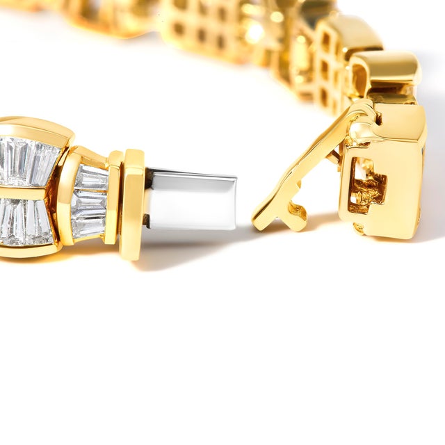 Imagine the soft clasp of luxury as this 14K yellow gold bracelet encircles your wrist, exquisitely designed to accentuate...