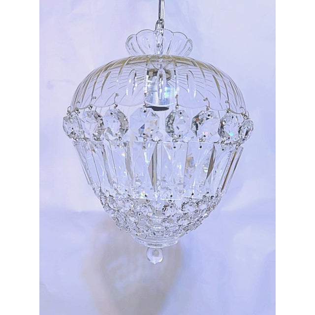 Decorative hand cut basket chandelier with hand cut glass dish frame and 30% leaded A-chain crystals. Rewired and it has...