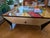 Handmade solid wood coffee table with 2 drawers. Hand signed by artist