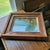 This vintage original acrylic still life painting landscape features serene yucca trees near a river. The small framed...