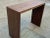 Mid century style solid walnut console. Console is finished in a light walnut/satin finish. The console is made of solid...