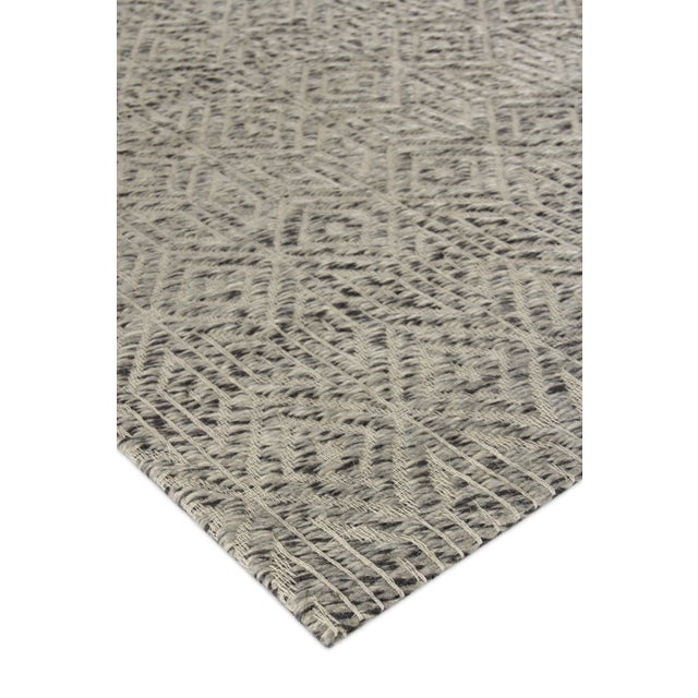 Texture, pattern, color! Handmade with 100% New Zealand wool, the beautiful geometric design of the Sanz rug make it ideal...