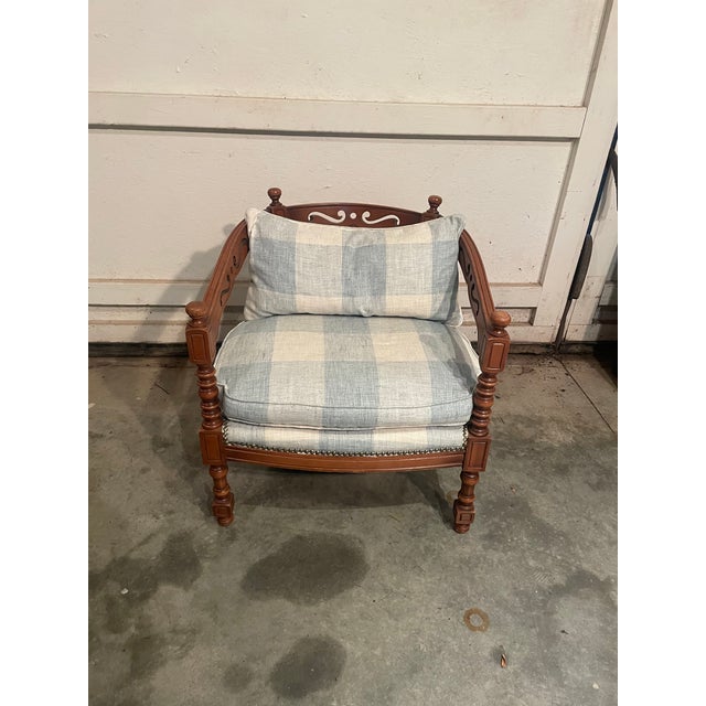 A lovely and unique shaped French Armchair. The chair features unique carving in the wood and is a one of a kind...