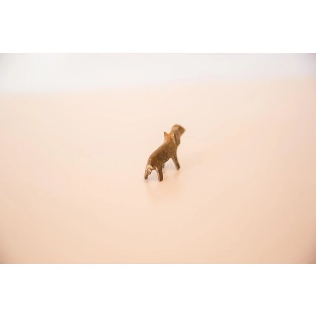 :: Vintage handmade bronze casting of a miniature hippopotamus with dusty patina. Circa mid 20th century and possibly...