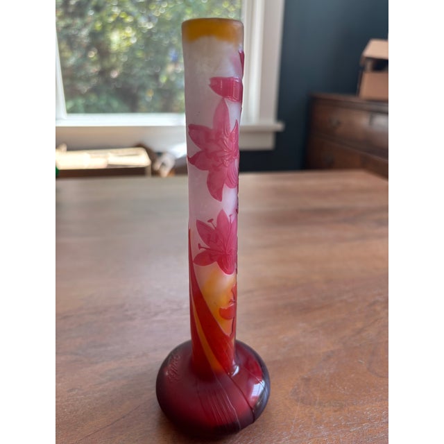 Absolutely stunning multi-layered Emile Galle signed stick vase with vibrant yellow, white, red, and orange acid etched...