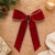 Add a touch of luxury to your holiday decor with this jeweled holiday bow. Featuring a festive red tone with soft...