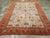 An antique Turkish Oushak room size carpet handmade during the Early 20th century. Measures: 9' 9" x 13' 0"