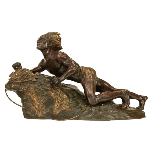 A fine & large antique French Art Deco bronze of a Native American scout or brave, by René-André Varnier, circa 1920. This...