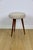 Round beige stool made of boucle fabric. Vintage PRL stool manufactured in the 1970s. Fully restored, upholstered in a...