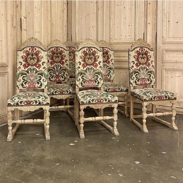 Set of 6 Mid-Century Renaissance Revival Dining Chairs feature finely carved seatback crowns and finely turned legs and...