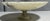 An elegant early 20th-century Italian tazza centerpiece carved from richly veined marble. The shallow circular bowl rests...