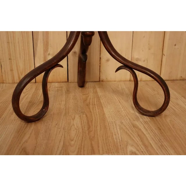 Rare curved wooden hot seat, stamped Fischel. Era began XX th, 1900/1920. Excellent original condition. Three -arms base,...